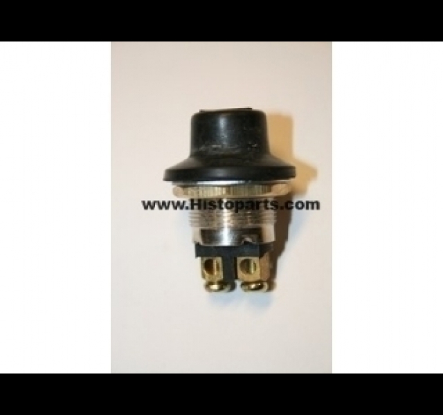 Horn switch with rubber cover.