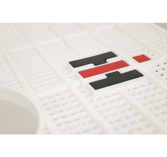 Badge for plastic Grille International in detail